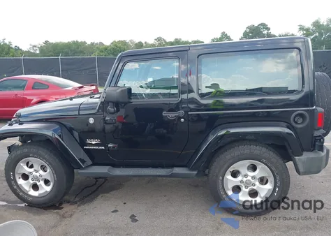 2015 Jeep Wrangler Sahara z USA, uszkodzony, nr VIN 1C4AJWBG4FL605659
